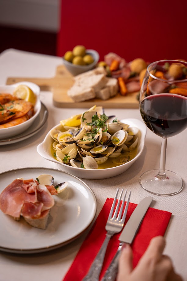 Clams and cured ham plate