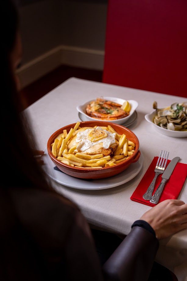 Chicken with fries and fried egg